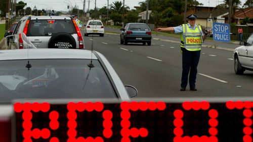 A roadside random breath test.