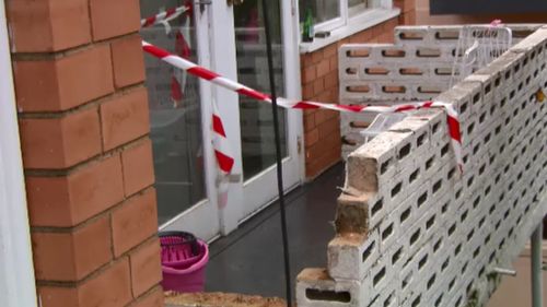 The balcony is believed to have collapsed during a house warming party. (9NEWS)