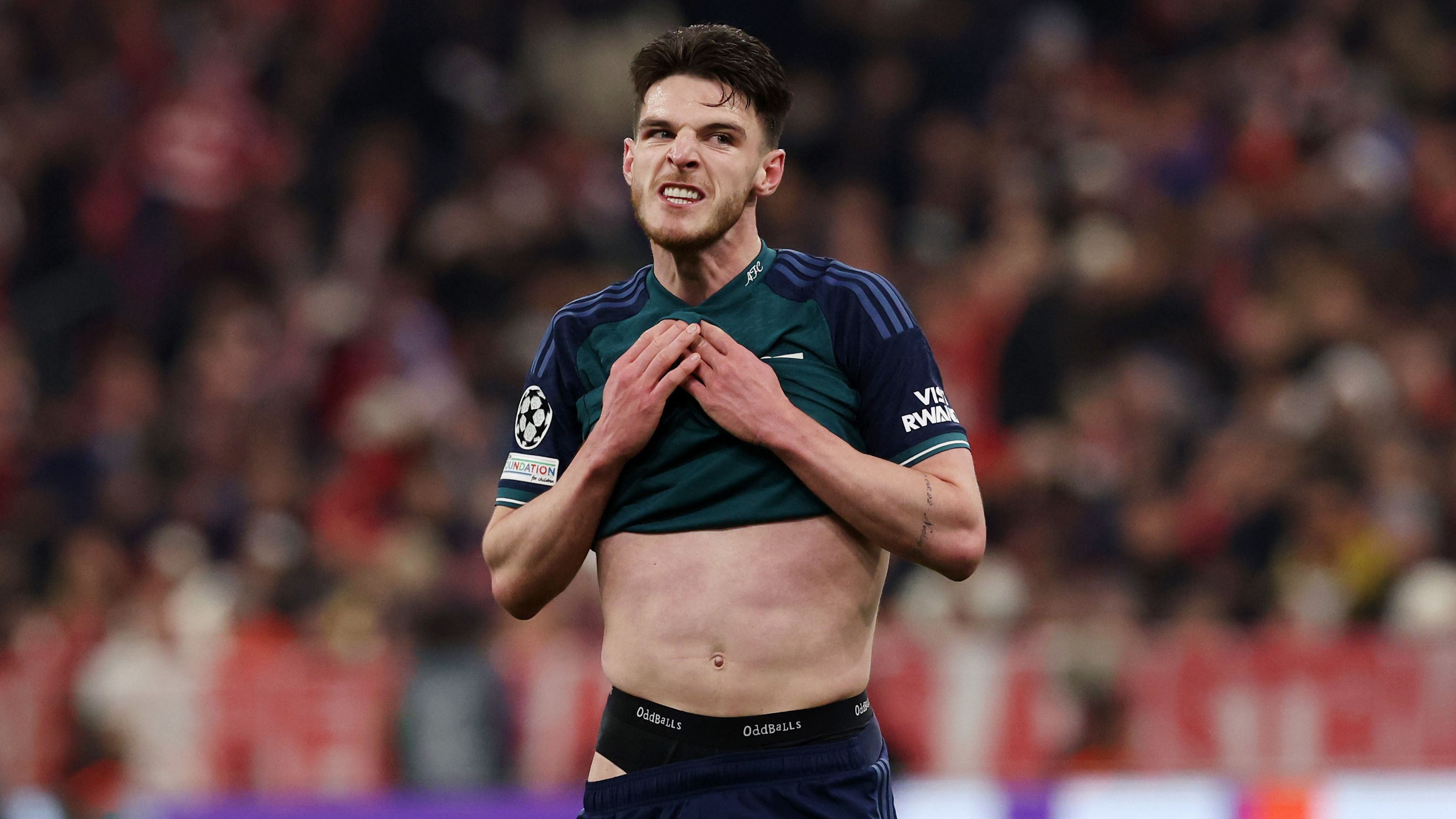 Declan Rice of Arsenal looks dejected at Allianz Arena.