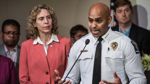 Kerr Putney, chief of the Charlotte-Mecklenburg police, right, and Charlotte Mayor Jennifer Roberts field questions from the media September 23, 2016 in Charlotte, NC. (AFP)