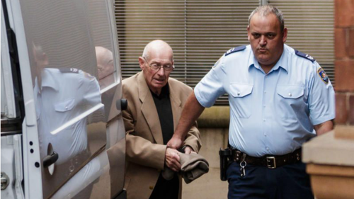 Roger Rogerson at the Supreme Court of Australia following his arrest in 2014. (Brook Mitchell/Fairfax Media)