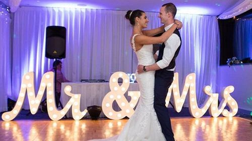 Kelly Clarke and her husband at their wedding in April.