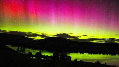 <p>A severe geomagnetic storm created a stunning and rare light show in the skies above NSW and Western Australia on Wednesday.</p><p>
The lights, aurora australis, are often visible from New Zealand and Tasmania, however, watching rights were extended to the two mainland Australian states around 1am yesterday morning. </p><p>
Those lucky enough to be awake flocked to social media to document the natural phenomena, also known as the Southern Lights, which painted the dark sky an orb-like spectrum of green, purple and pink. </p><p>
One Kiama, NSW man recorded the stunning sight from his backyard as it unfolded, later <a href=" https://www.youtube.com/watch?v=aq2yb2-gz-E "> posting the video online</a> keen to share his spoils. </p><p>
"This is insane … oh my God, look at that," the ecstatic night-watcher narrated the clip. </p><p>
The rare event was also witnessed in the Northern Hemisphere over parts of the US and Europe, where it is called aurora borealis. </p><p>
Both auroras were sparked by a particularly strong solar storm that sent charged solar particles hurtling towards earth, according to the Australia Bureau of Meteorology. </p><p>
"These collisions cause the neutral atoms to fluoresce, emitting light at many different wavelengths," a spokesman told <a href=" http://www.abc.net.au/news/2015-03-18/aurora-australis-captured-on-social-media/6327840 "> ABC News</a>. </p><p>
"The most common aurora colours are red and green, caused by the fluorescence of oxygen atoms, while nitrogen atoms can throw bluish-purple lights into the mix." <i>Photo of Lake Ruataniwha, NZ by RDVB Photography</i></p>
