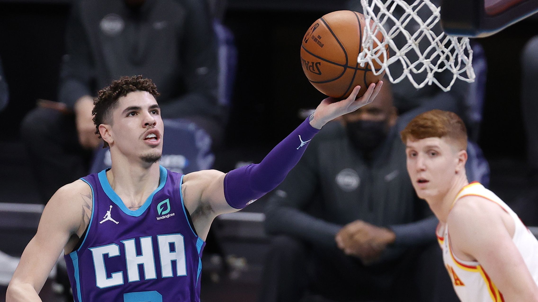 LaMelo Ball of the Charlotte Hornets attempts a lay up.