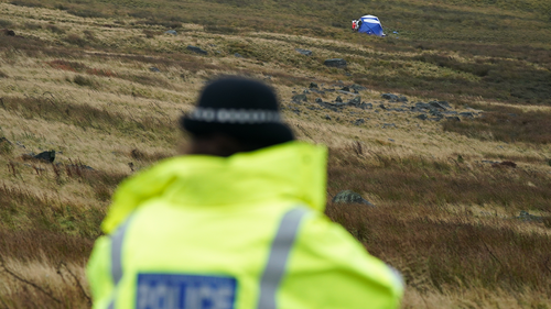 Police guard the area around the dig site on Saddleworth Moor for murder victim Keith Bennett as they investigate suspected human remains on October 01, 2022 in Oldham, United Kingdom. 
