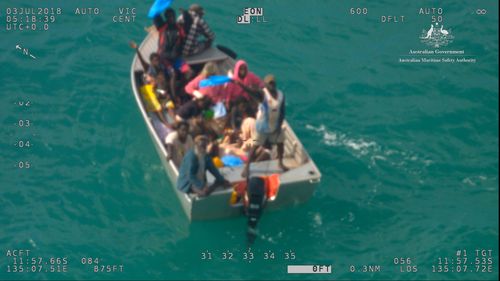 There were fifteen people - including five children - on board the 4.4 metre dinghy. Picture: AMSA