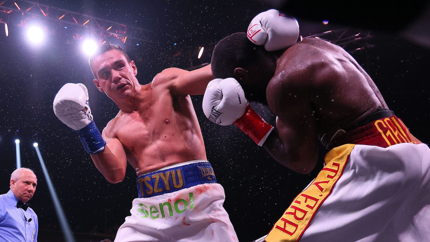 MINNEAPOLIS, MN - MARCH 26: Tim Tszyu (white with blue trunks) v Terrell Gausha (white with red and gold trunks) box in the Super Welterweight main event at the Armory on March 26, 2022 in Minneapolis, United States. Tszyu, in his USA debut defeated Gausha by judges decision. (Photo by Adam Bettcher/Getty Images)