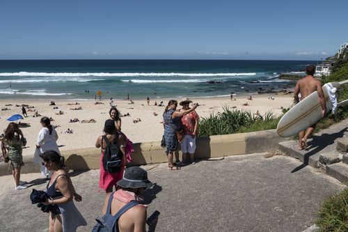 Beachgoers on a hot day in Bondi Beach, on March 17, 2023. Sydney's heatwave is expected to peak later today. 