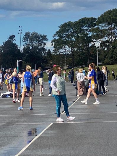 Helen Ryan coaching her Division 5 under 15's netball team for Randwick Rugby Netball Club on their grand final day.
