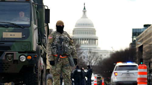 A National Guard stands at a road block outside the Capitol as security is ramped ahead of President-elect Joe Biden's inauguration ceremony Monday, Jan. 18, 2021, in Washington. (AP Photo/Matt Slocum)