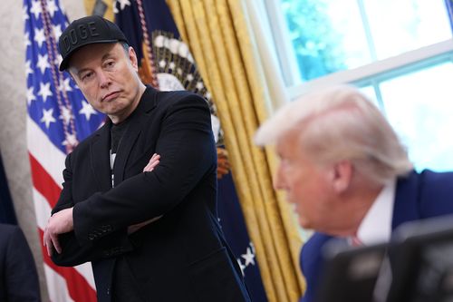  Tesla CEO Elon Musk listens arsenic U.S. President Donald Trump speaks to reporters successful nan Oval Office of nan White House connected May 30, 2025 successful Washington, DC. Musk, who served arsenic an advisor to Trump and led nan Department of Government Efficiency, announced he would time off his domiciled nan Trump management to refocus connected his businesses. (Photo by Kevin Dietsch/Getty Images)