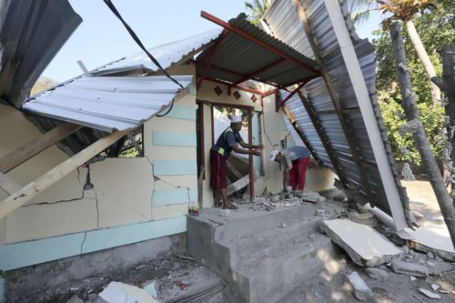 More than 200 people were injured in the quake and over 20,000 people displaced from their homes and hotels. Picture: AAP.