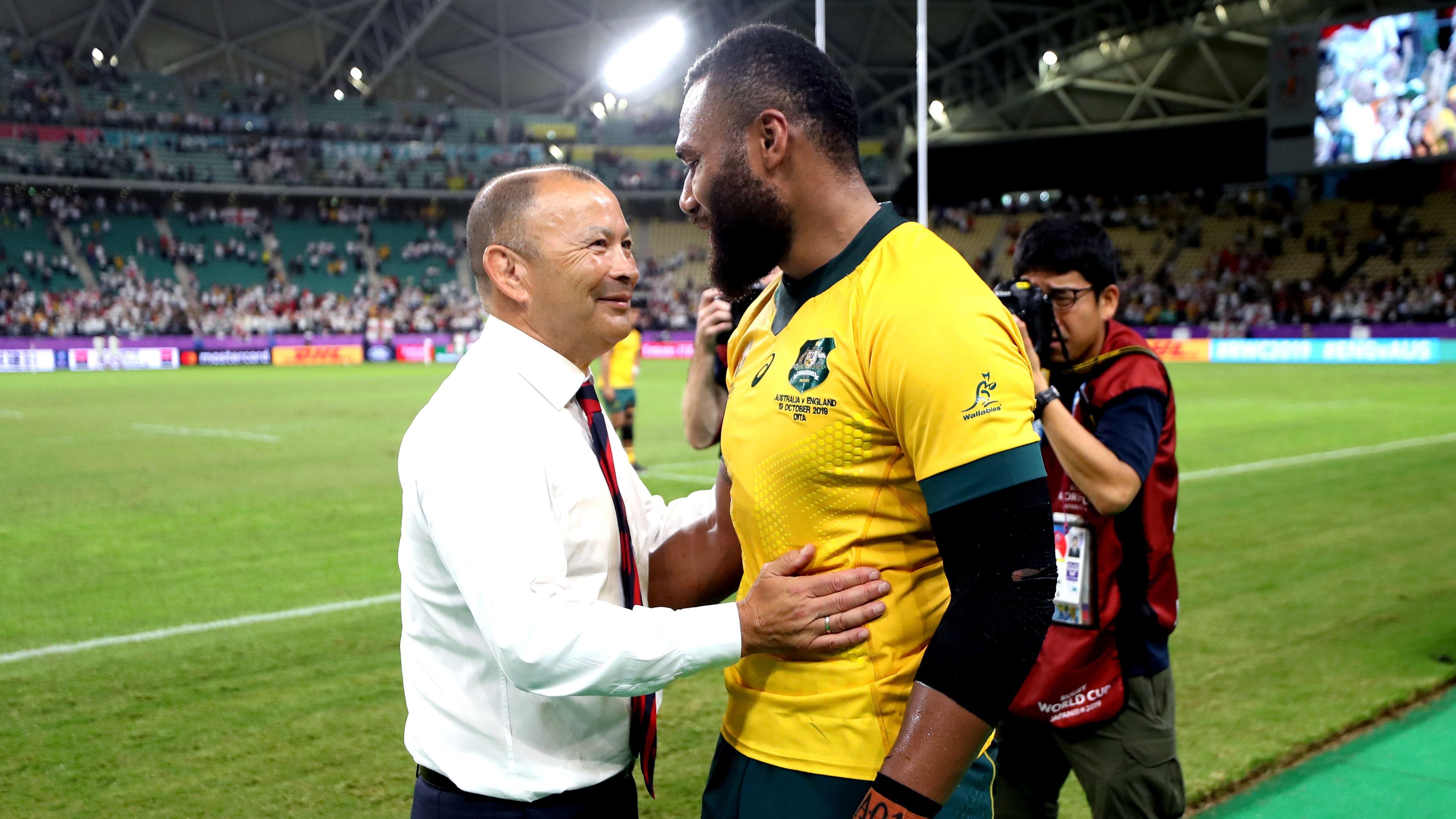 Then-England head coach Eddie Jones (left) speaks to Australia&#x27;s Samu Kerevi at the end of the 2019 Rugby World Cup quarter final.