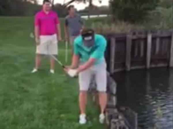 Golf trick shot ends in low blow