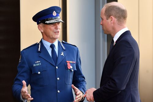 New Zealand's Commissioner of police Mike Bush receives Britain's Prince William (R) at the Justice and Emergency Services Precinct in Christchurch on April 25, 2019.