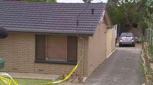 Man charged after children find mother's lifeless body in car outside Adelaide home