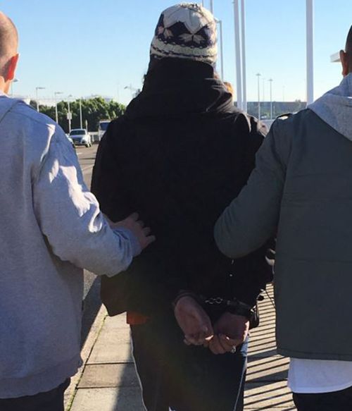 The man was arrested at Sydney Airport today. (AAP)