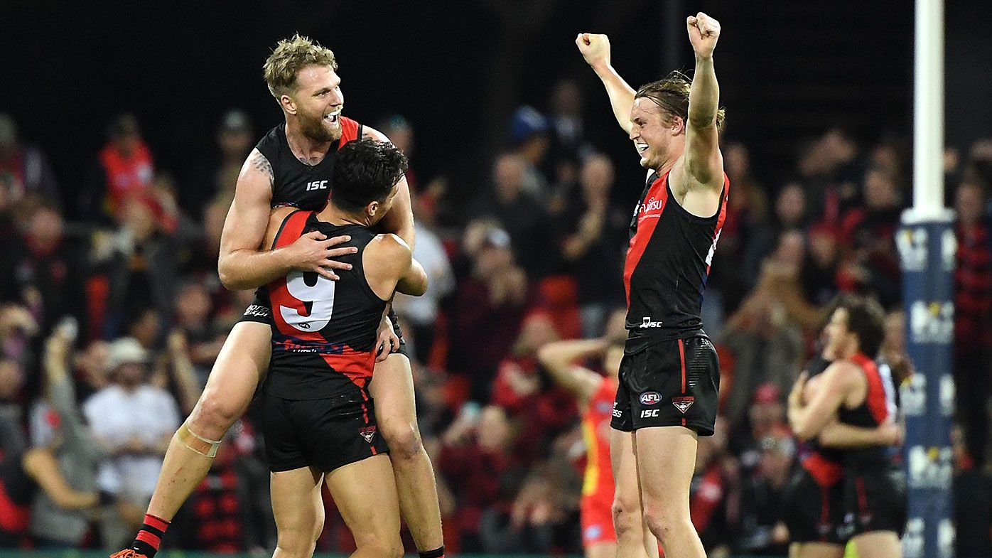 Essendon nails two goals inside final minute to steal win against Gold Coast Suns
