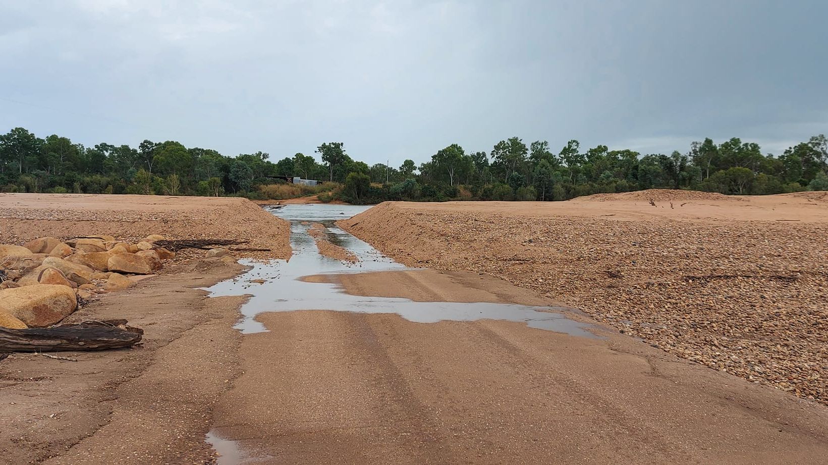 As she stood on the path water started creeping up the road. She said 4mm of rain was recorded yesterday, adding the river is "bound to rise by tomorrow" with the falls forecast today.