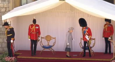 The Queen chats to the Duke of Kent at the conclusion of the ceremony.