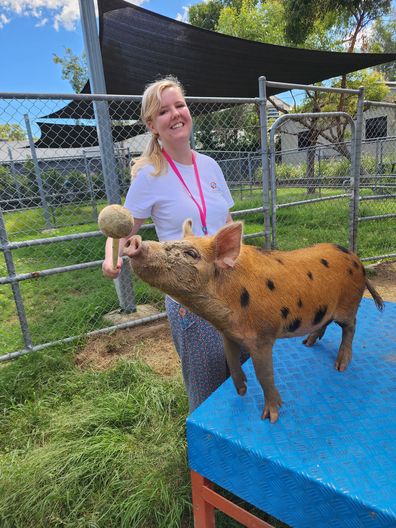 Caitlin Kelly even got to target train a rescue pig, who will grow to 300 kilos.