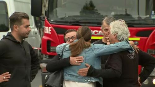 The Pentaris family supported each other at the scene of the fire this morning.