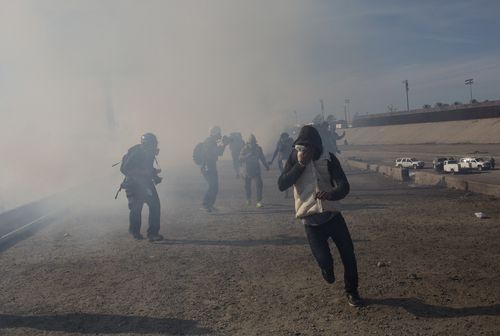 Border guards were forced to use potent teargas on the migrants attempting to cross the border after a treacherous two week journey.