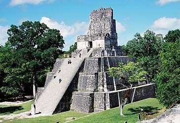 Which pre-Columbian empire built Tikal in modern-day Guatemala?