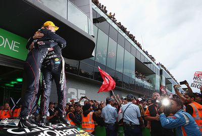 Lowndes and Richards - who claimed his fourth win - embraced atop the car.