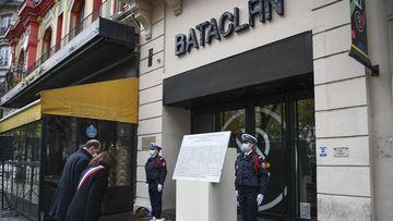 French Prime Minister Jean Castex, left, and Paris Mayor Anne Hidalgo participate in a wreath laying ceremony, marking the 5th anniversary of the Nov. 13, 2015 attacks outside the Bataclan concert hall in Paris, Friday, Nov. 13, 2020