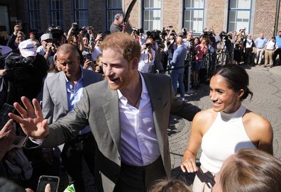 Prince Harry and Meghan, Duchess of Sussex, meet people after a visit at the town hall in Duesseldorf, Germany, Tuesday, September 6, 2022. 
