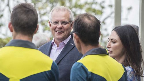 Scott Morrison meets members of the Australian and New Zealand cricket teams at Kirribilli House yesterday.