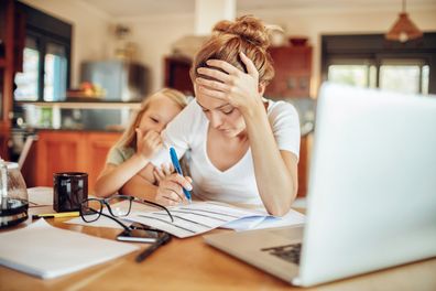 Close up of a mother going through her financials