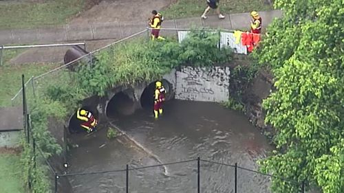 Emergency services launched a major search of the Indooroopilly stormwater drain network. (9NEWS)