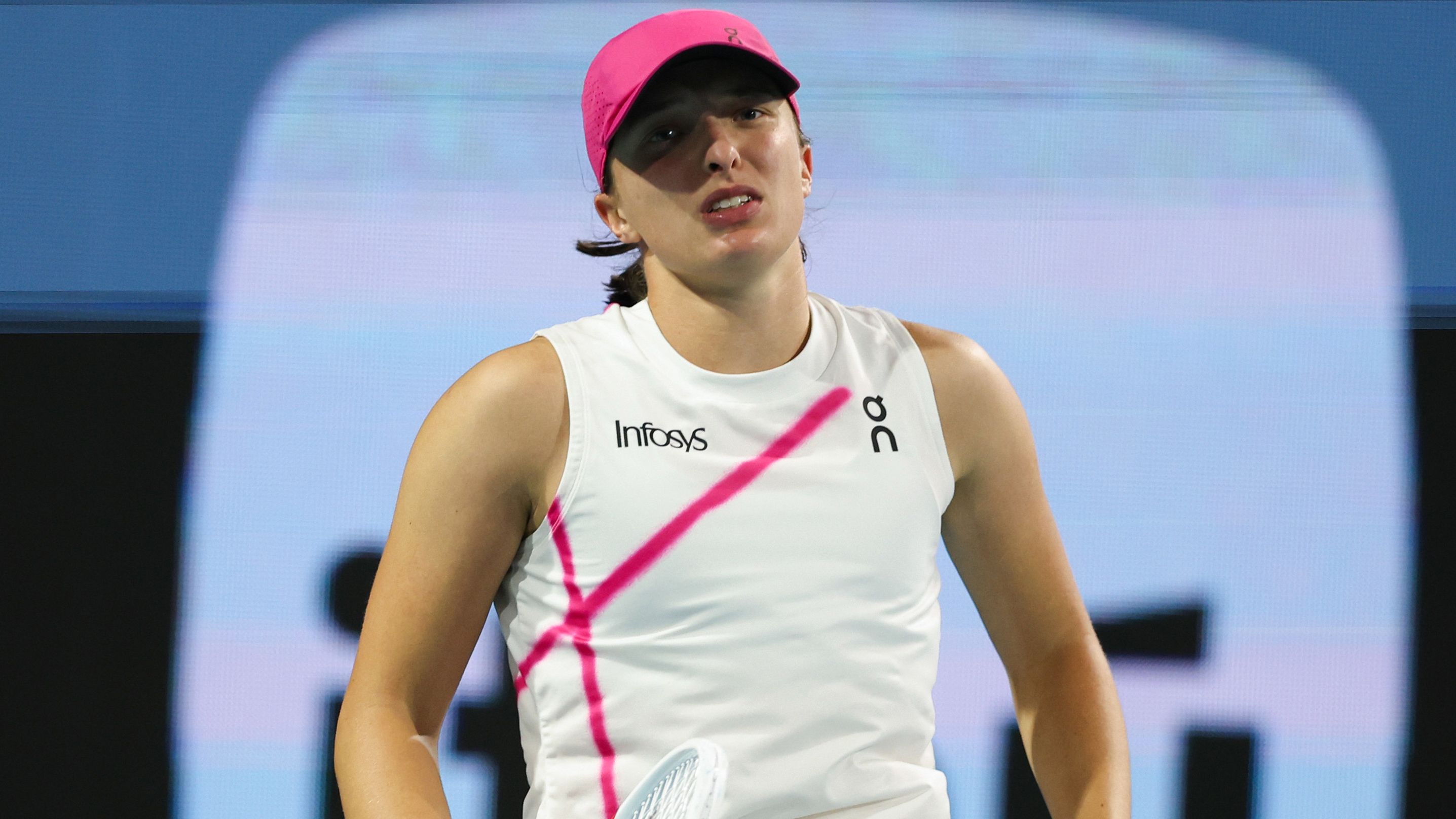 Iga Swiatek reacts during her women&#x27;s singles match against Ekaterina Alexandrova at the Miami Open.