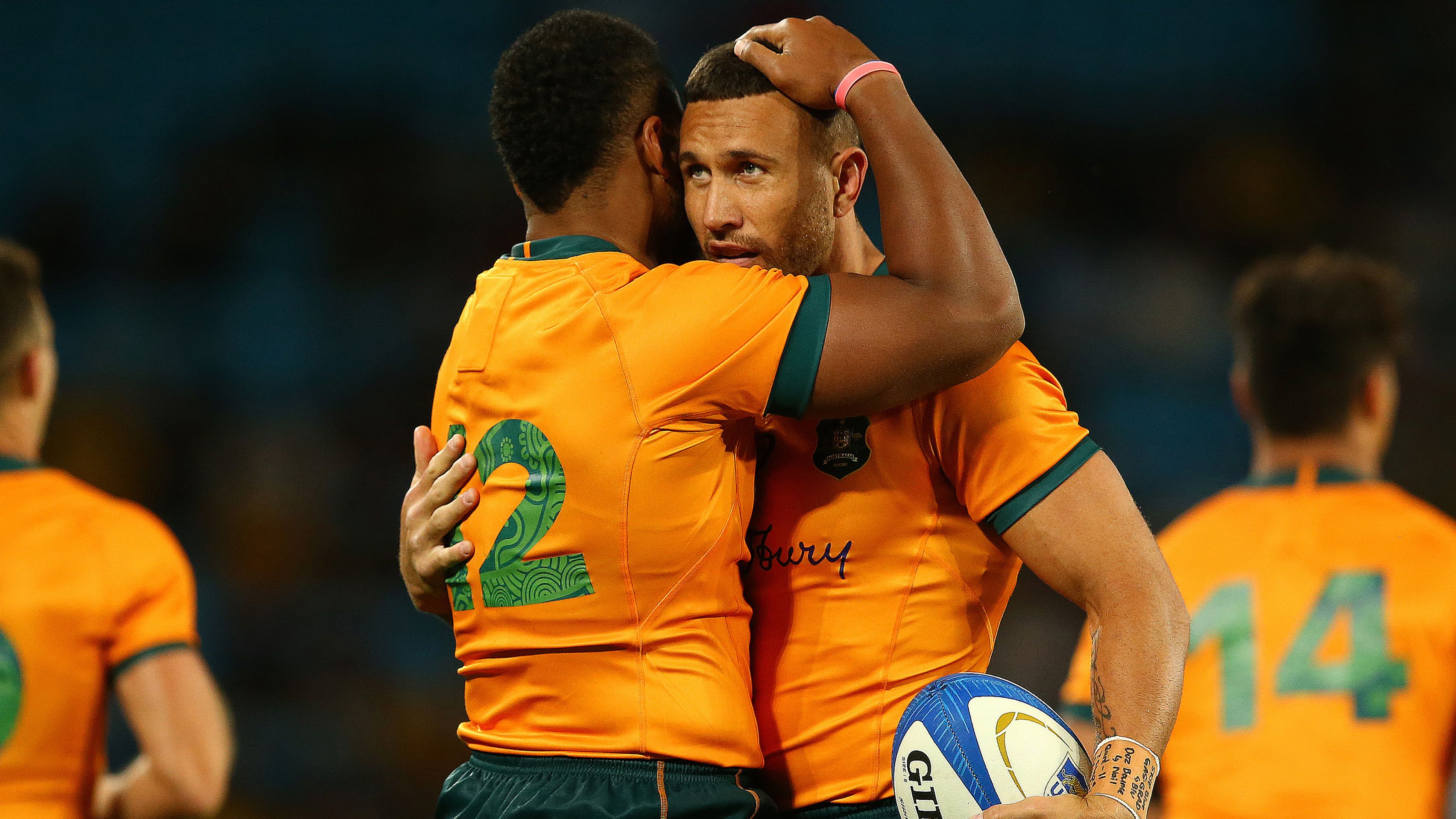 Samu Kerevi and Quade Cooper of the Wallabies celebrate a try during The Rugby Championship match between the Argentina Pumas and the Australian Wallabies at Cbus Super Stadium on October 02, 2021 in Gold Coast, Australia. (Photo by Jono Searle/Getty Images)