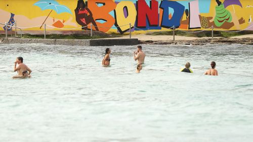 Swimmers in the water at the north end of Bondi (Mark Kolbe).