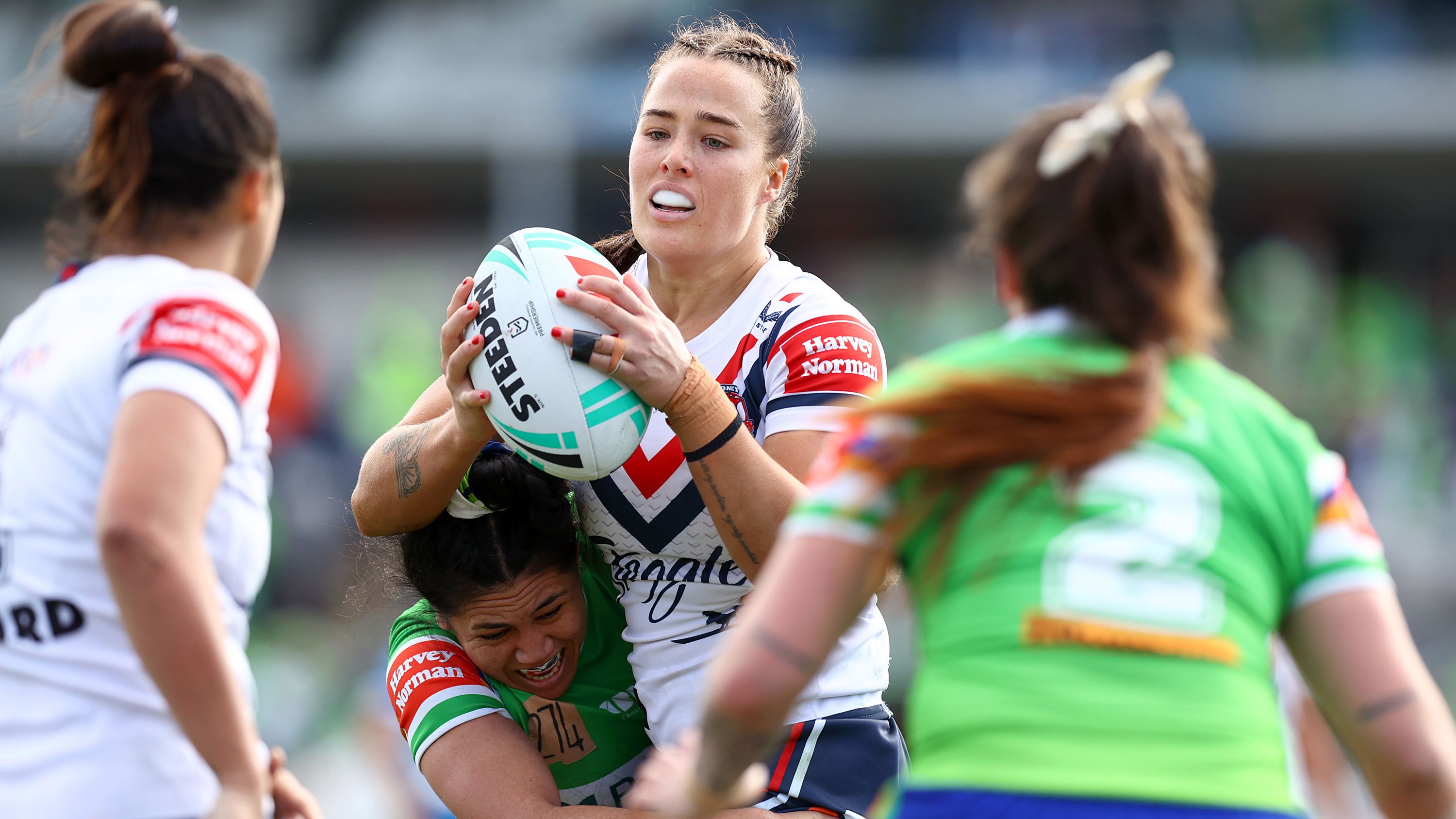 Isabelle Kelly of the Roosters in action.