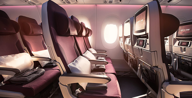 The inside of a Qatar Airways plane.