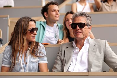 PARIS, FRANCE - JUNE 11: Actor Hugh Grant watches on from the crowd during the Men's Singles Final match between Novak Djokovic of Serbia and Casper Ruud of Norway on Day Fifteen of the 2023 French Open at Roland Garros on June 11, 2023 in Paris, France. (Photo by Clive Brunskill/Getty Images)