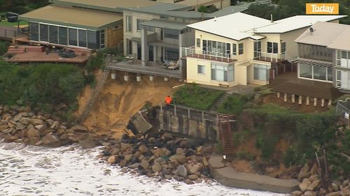 One homeowner lost his balcony to erosion.