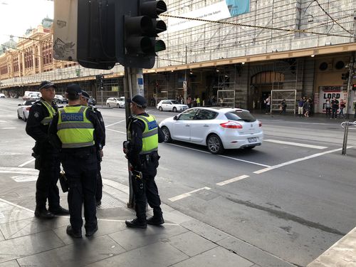 Police are on every corner of the street this morning.