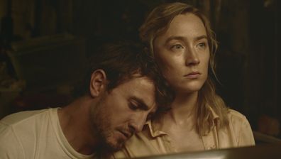Saoirse Ronan, right, and Paul Mescal in a scene from "Foe."  