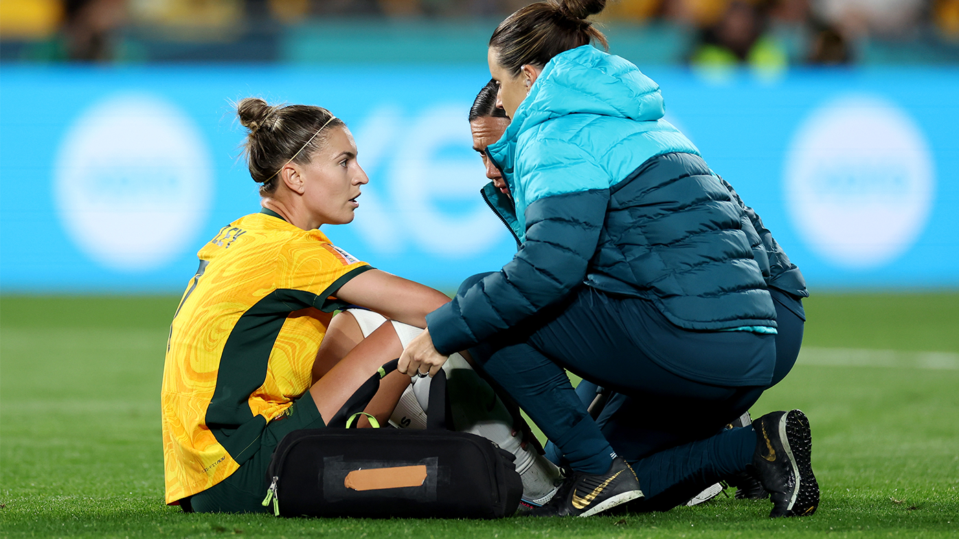 Steph Catley receives medical attention during the FIFA Women&#x27;s World Cup Australia &amp; New Zealand 2023 round of 16 match between Australia and Denmark at Stadium Australia.