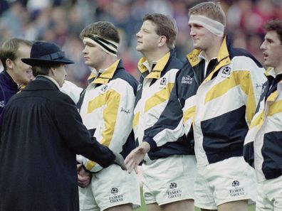 Scotland player Doddie Weir shakes hands with Anne, Princess Royal before an match against Australia in 1996.