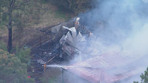 At least one home was completely destroyed by the fire. 