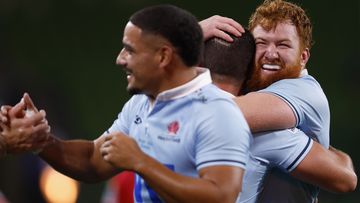 Waratahs celebrate their win after the round two Super Rugby Pacific match between Crusaders and NSW Waratahs at AAMI Park.