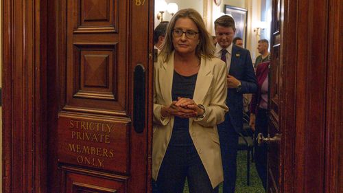 Jacinta Allan exits the caucus room after being elected unopposed.