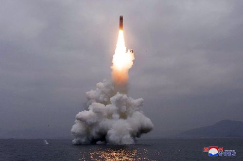 An underwater-launched missile lifts off in the waters off North Korea's eastern coastal town of Wonsan. (Korean Central News Agency/Korea News Service via AP)