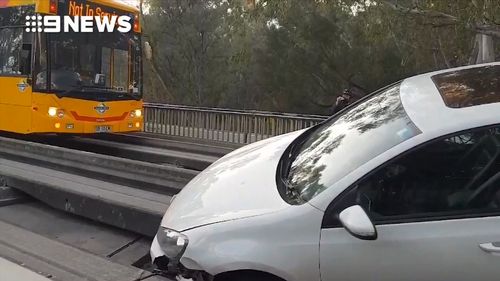 The hatchback blocked the tracks in both directions until it was removed around 8am.